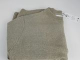 the sweater is tan and has a white tag on it