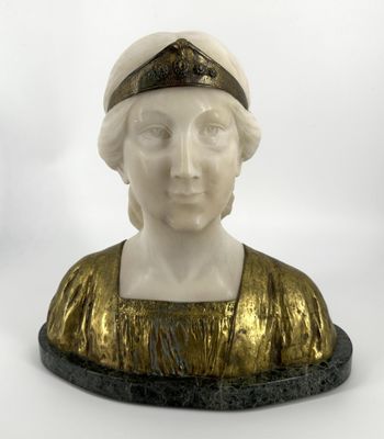 statue of a woman in a gold dress with a hat on her head