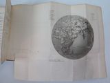 an open book with a drawing of the earth on it