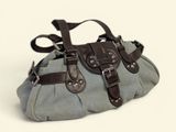 a gray purse with brown straps on a white background