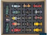 a box with a lot of toy cars in it