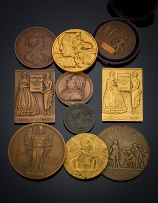 a close up of a bunch of coins on a table