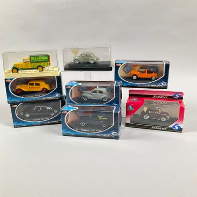 six different models of cars in boxes on a white surface