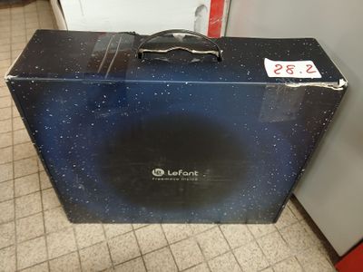a suitcase that is sitting on the floor in the room