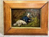 an oil painting of a man kneeling on the ground next to a tree