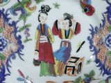 a plate with a picture of two people on it