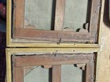 two pieces of wood that are sitting on a table