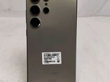 the back of a silver samsung note9 with a sticker on it