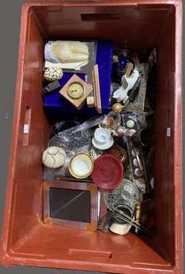 a box full of assorted items sitting on a table
