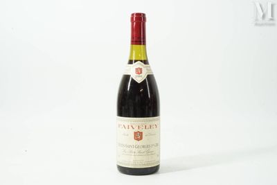 a bottle of wine that is sitting on a table