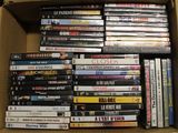 a lot of dvds in a box on the table