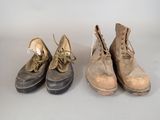 three pairs of shoes are lined up on a white surface