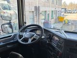 a view of the inside of a bus from the driver ' s seat
