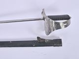 two tools that are laying on a white surface
