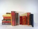 a lot of books that are sitting on a table