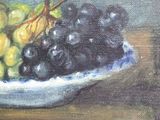 a painting of grapes in a bowl on a table