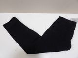 black skinny jeans on a white surface with a white background