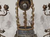 a clock that is sitting on top of a table