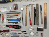 a lot of tools that are laying out on the table