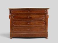 Commode en placage d'acajou ouvrant par 4 tiroirs.