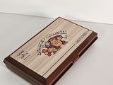 an image of a wooden box with a picture of a bear on it