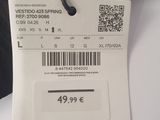 the back of a black jacket with a price tag on it