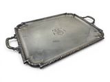 an antique silver tray with handles and handles on a white background