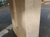 a concrete table that is sitting on the street