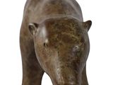 statue of a brown bear on a white background