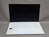 an image of a white laptop computer sitting on top of a table