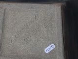 a picture of a cement box with a sticker on it