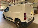 a white van that is parked in a garage