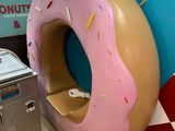 doughnut shaped like a donut with sprinkles and sprinkles on it