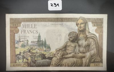une image représentant une femme et un enfant sur un billet de banque