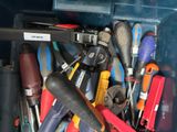 many different tools in a blue box together