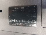 a close up of a metal panel with buttons on it