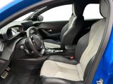the interior of a blue car is clean and ready to be used