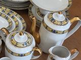 a table with a lot of plates and cups on it