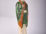 figurine chinoise représentant une femme, de couleur verte et orange
