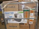 a metal cart with several boxes on it in a warehouse
