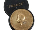 an image of a gold coin with a picture of a man on it