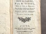 an open book with a picture of a bird on it