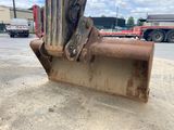 a bulldozer that is sitting in the dirt