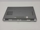 a laptop that is sitting on a white table