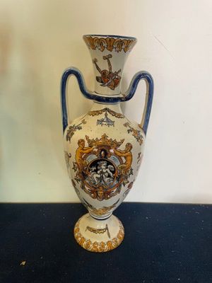 a vase that is sitting on a table in a room