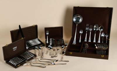 a box with silverware and a case with spoons and spoons