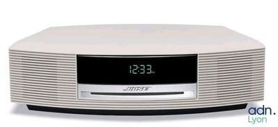 a clock that is on top of a radio
