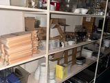 a room with a lot of items on the shelves