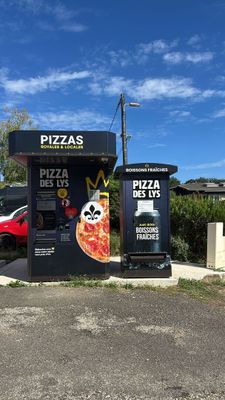 a pizza kiosk that has a panda face on it