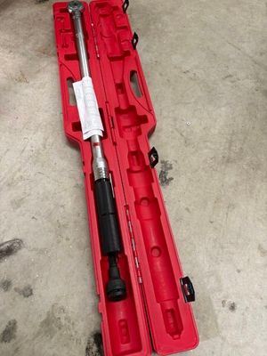 an image of a tool in a red case on the floor